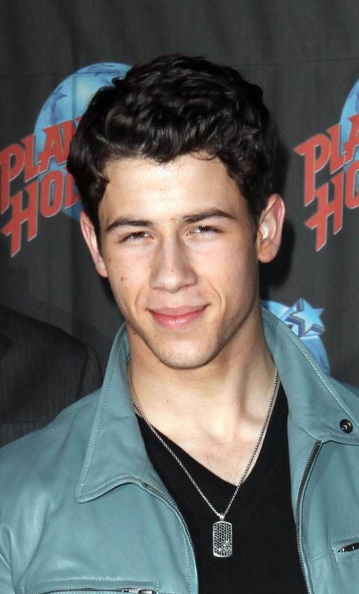 Nick Jonas promoting his play at Planet Hollywood Times square looking 