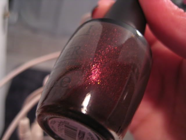 OPI,Burlesque,holiday,holiday 2010,Tease-y Does It,plum,red,shimmer,bottle pic